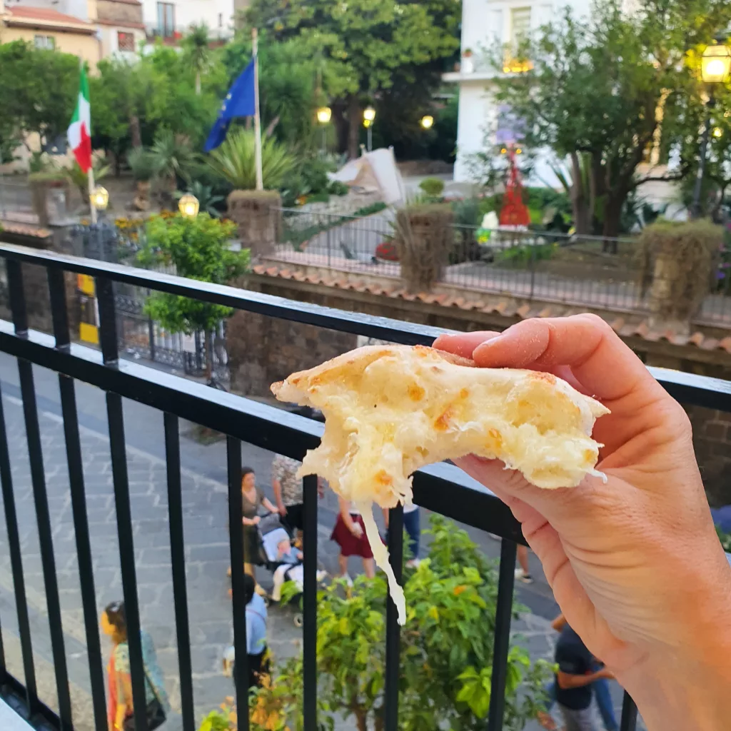 Enjoying pizza on the balcony