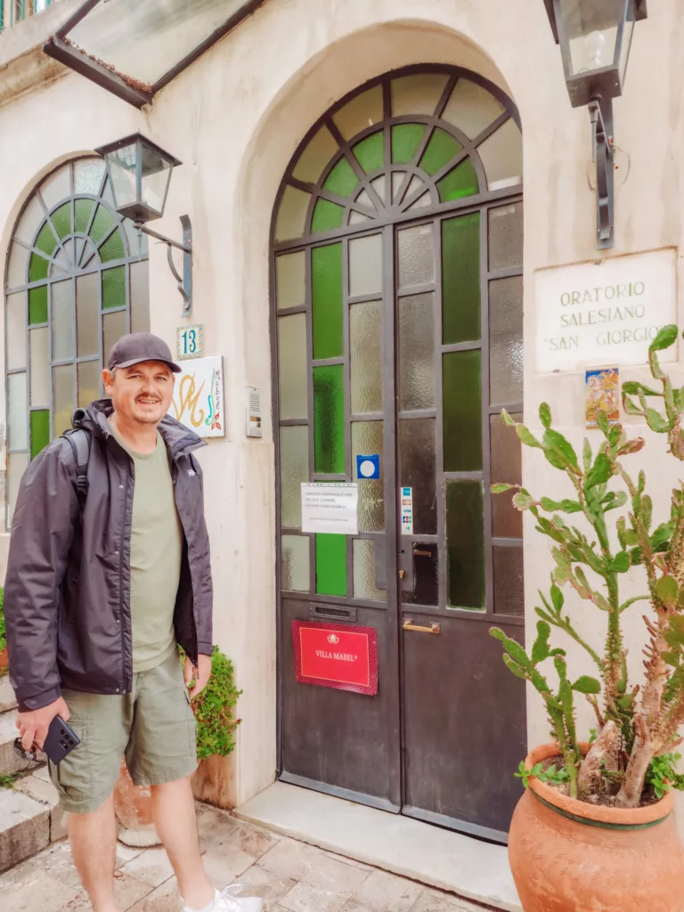 Mike standing outside Villa Mabel in Taormina