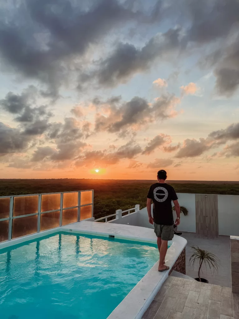 sunset at the roof top pool at Inkanto Luxury Hotel Mahahual Mexico Costa Maya