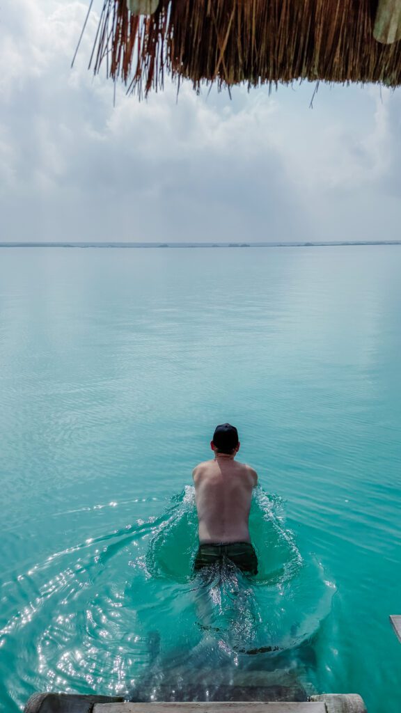 Mike swimming in the Bacalar Lagoon of 7 colours Bacalar Mexico