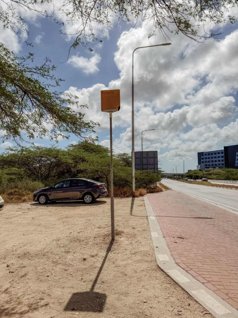 bus stop outside of Aruba Airport