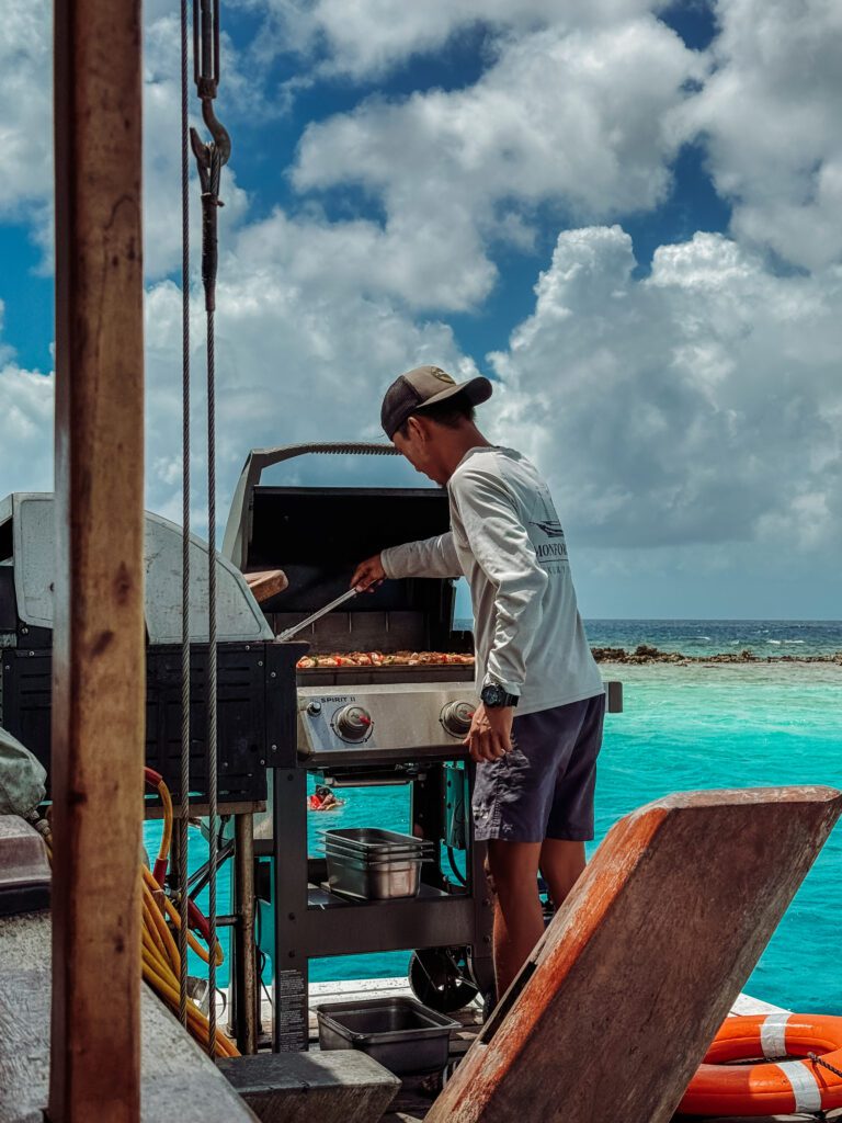 our chef cooking our BBQ lunch on our snorkelling cruise in Aruba