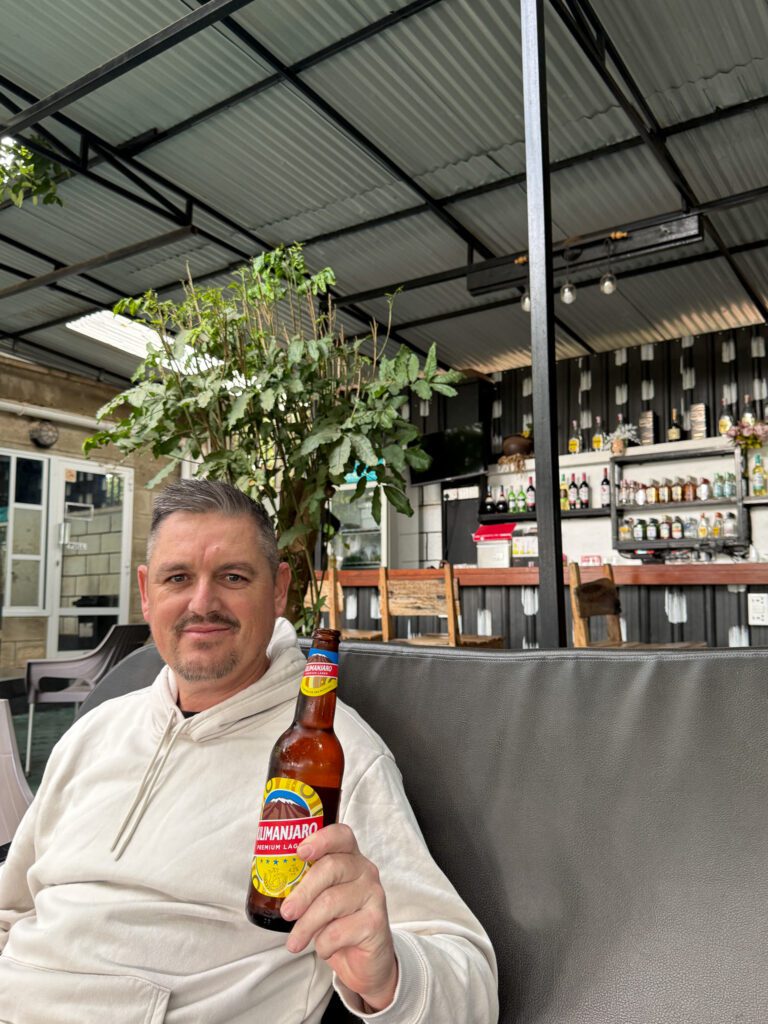 Mikes first beer on our African Serengeti Safari