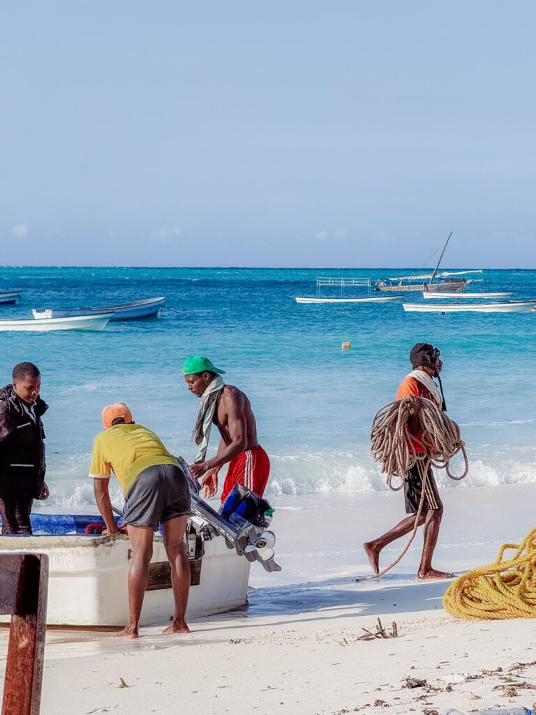 fishermen unloading catch at Nungwi