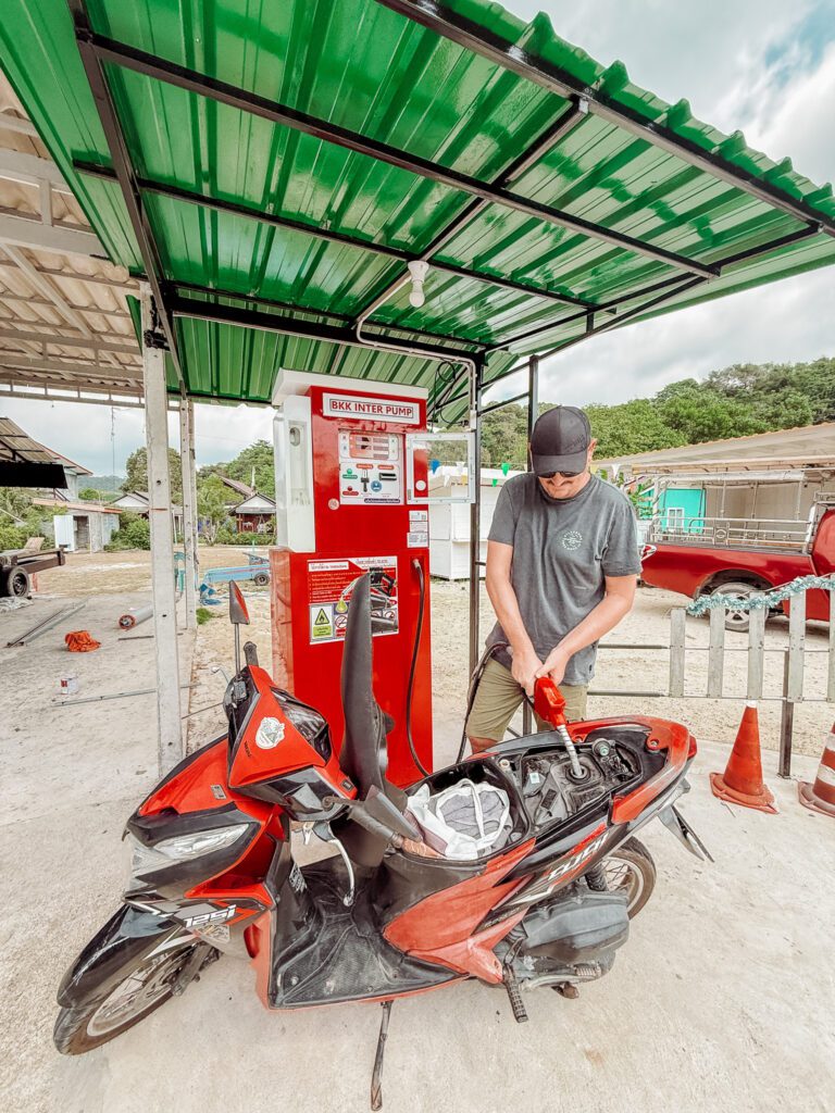 Mike filling Ko Kood scooter with fuel