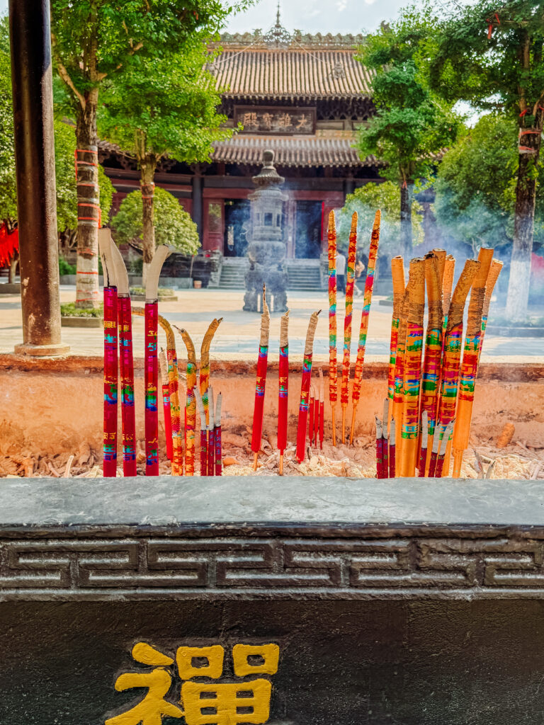 Candles and incense at a temple in Chongqing