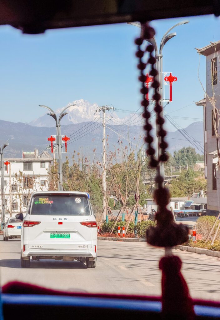 driving in to Lijiang first glimpse of jade dragon snow mountain