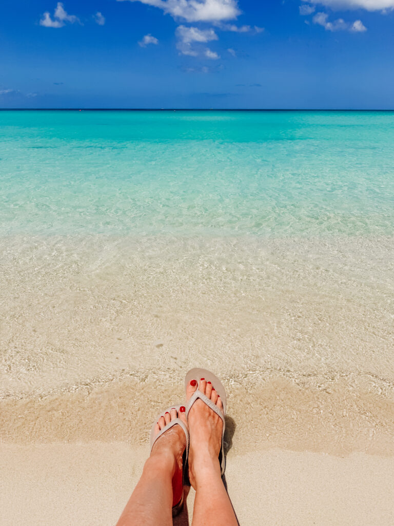 feet in the water at negril beach