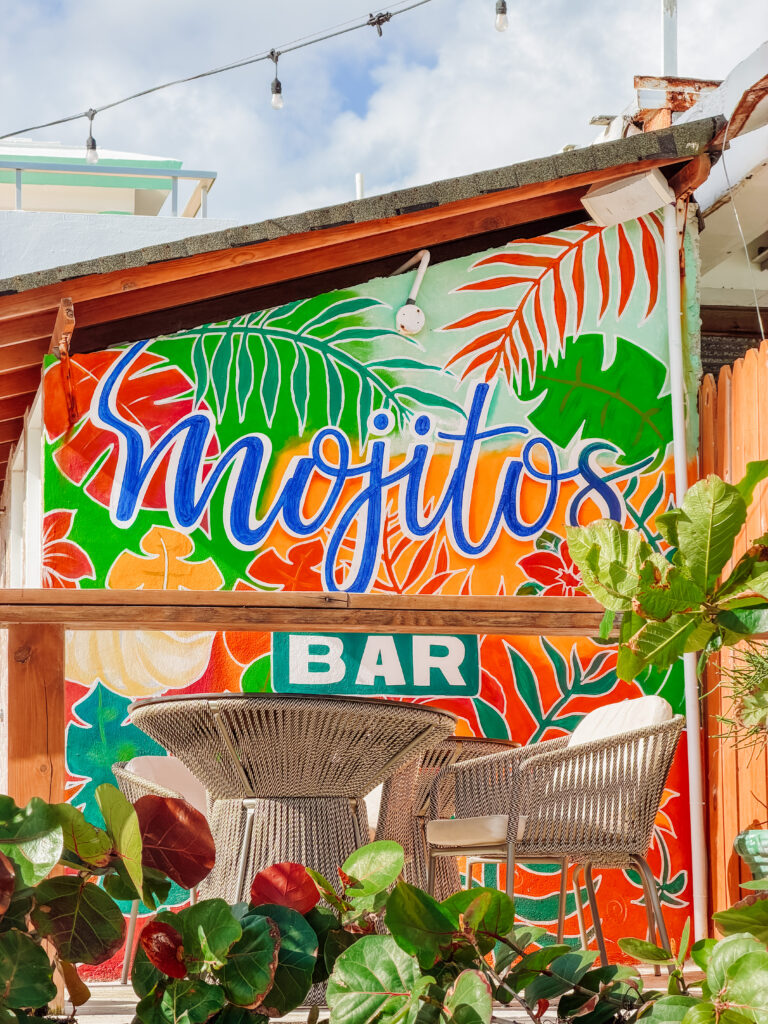 colourful beach bars line punta cana beach