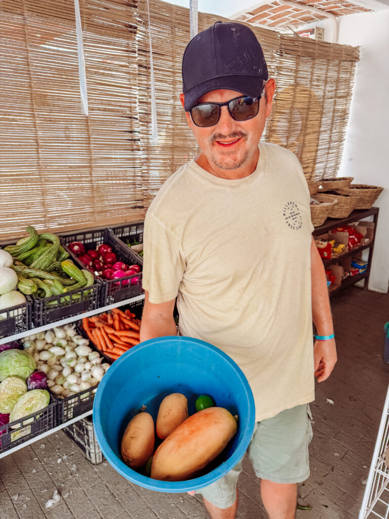 mike at the best fruit shop in san pancho, mexico