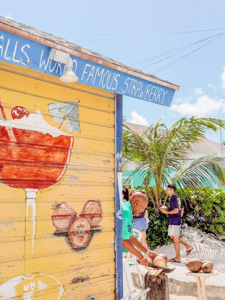cutting coconuts at the beach in nassau