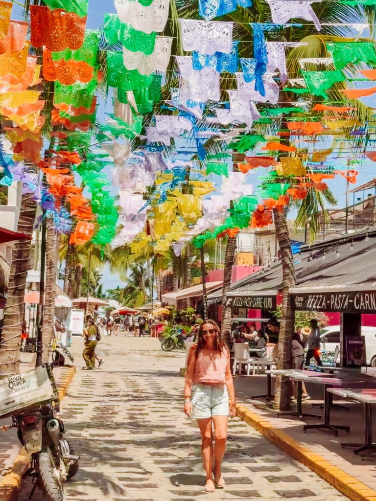 colourful flag street in sayulita mexico