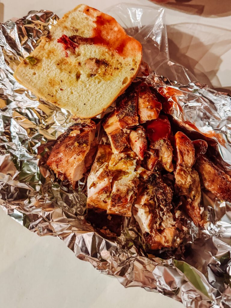 jerk chicken at the night market is a great thing to do in kingston, community orientated and good vibes