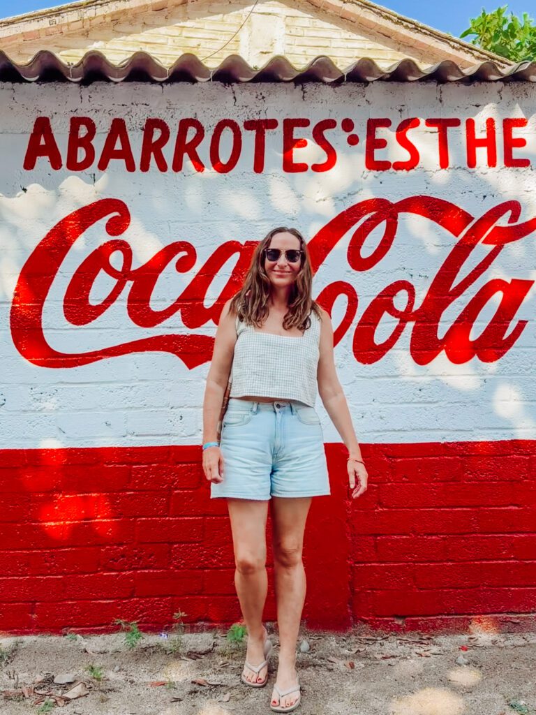 kelly with street art in sayulita mexico