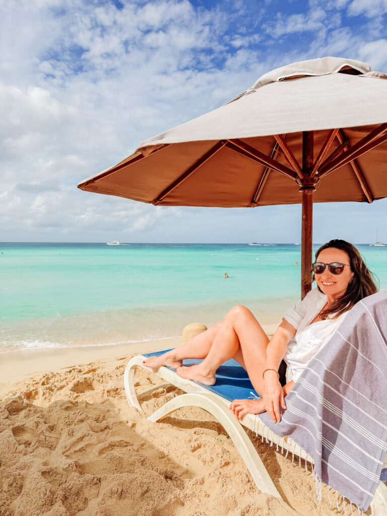 kelly sitting on our favourite beach in the dominican republic