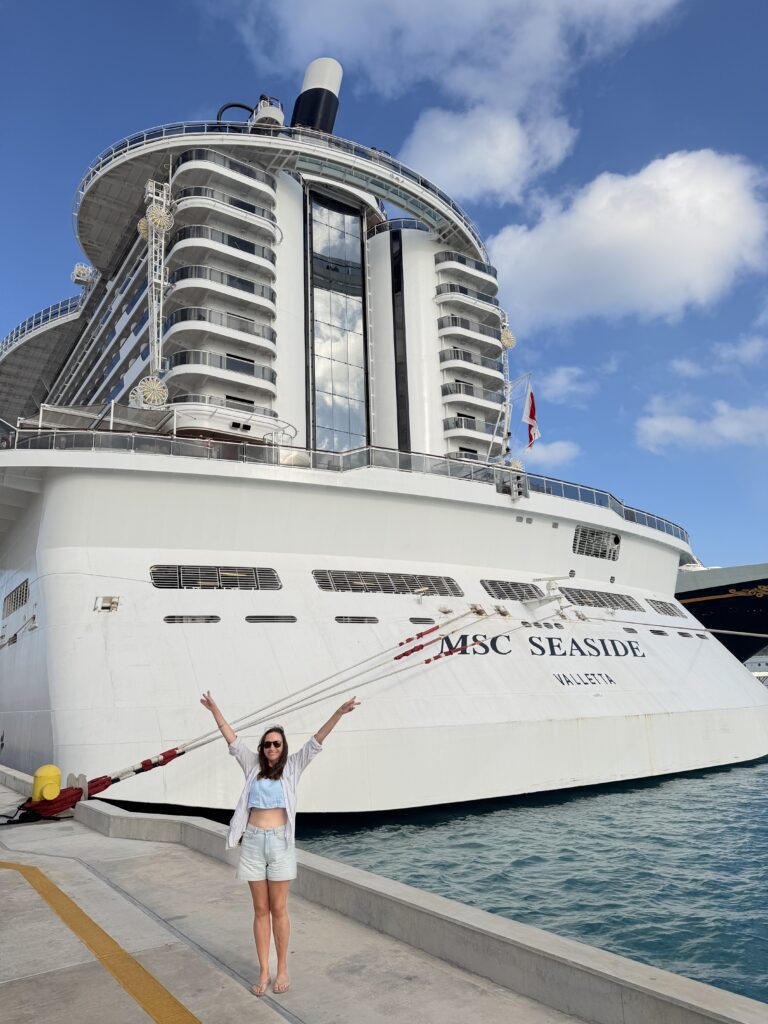 kelly in front of the MSC cruise ship on our bahamas cruise