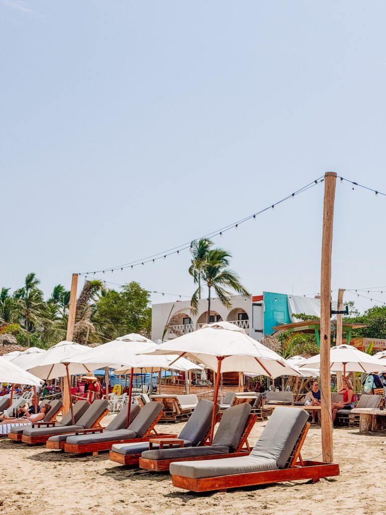 beach clubss on the main sayulita beach in mexico