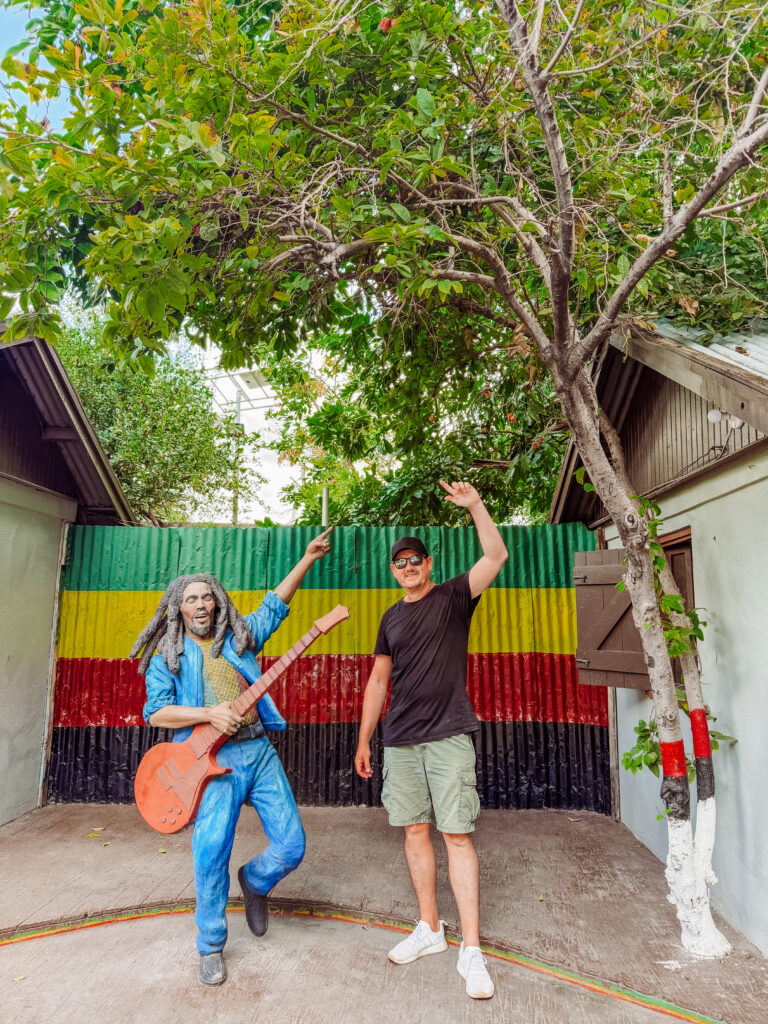 mike at the bob marley statue in kingston culture yard jamaica