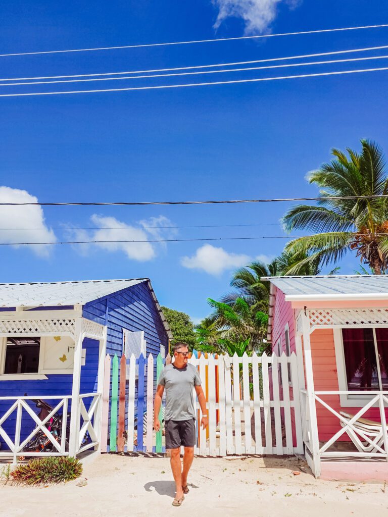 mike with buildings on saona beach
