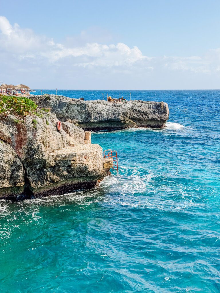 the cliffs at negril in jamaica are incredible and a dramatic change from the beach