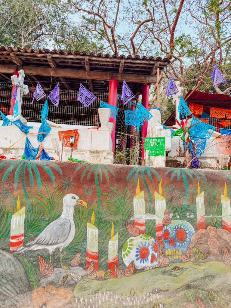 you have to walk the path through the cemetary to get to playa de los muertos sayulita mexico