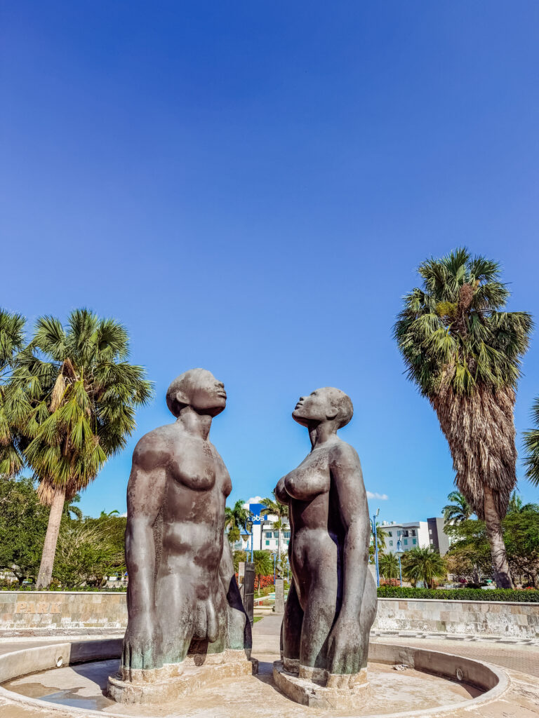 redemption song sculpture at emancipation park kingston