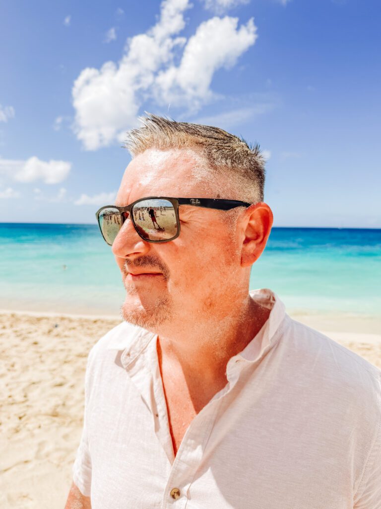 mike was coated in sand when a big plane took off from maho beach