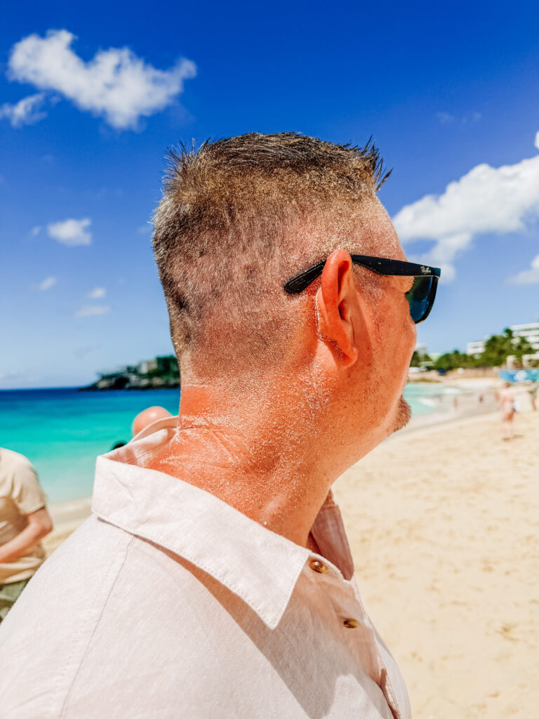 mike was covered in sand when the planes took off from maho beach