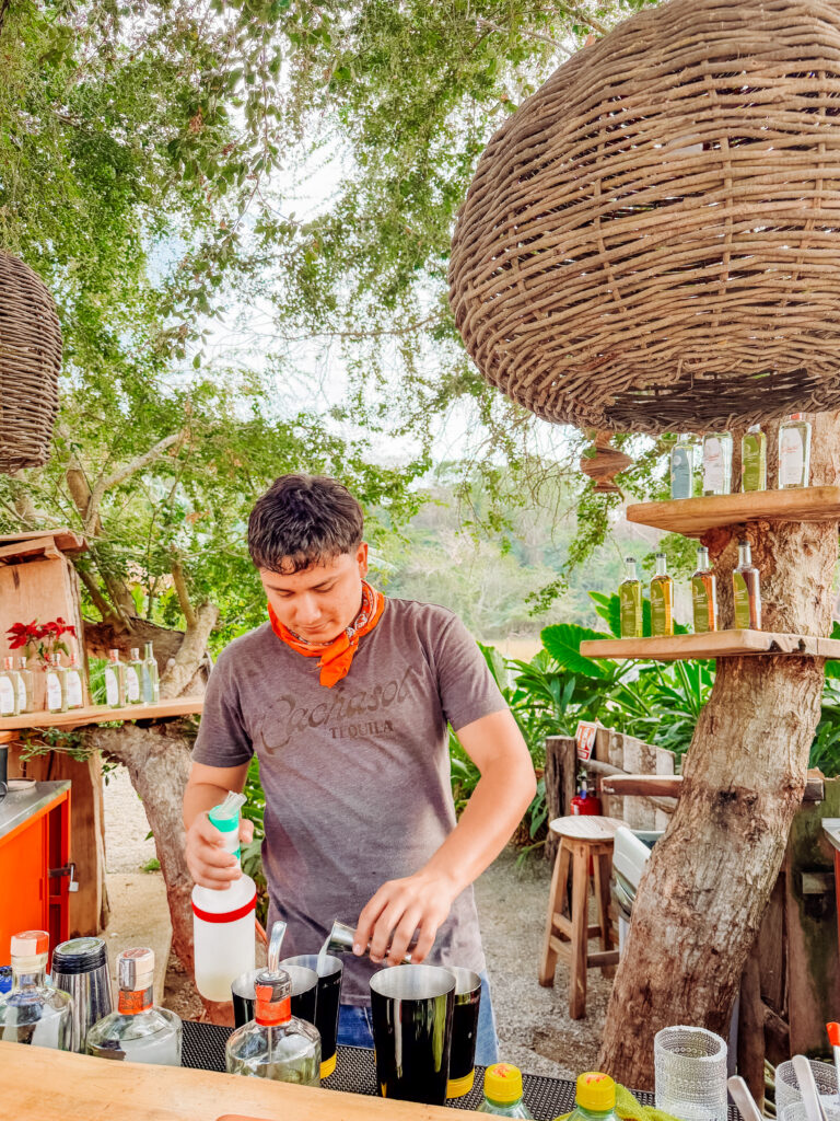 first taste of the small batch tequila at our tequila tasting on an agave farm near sayulita