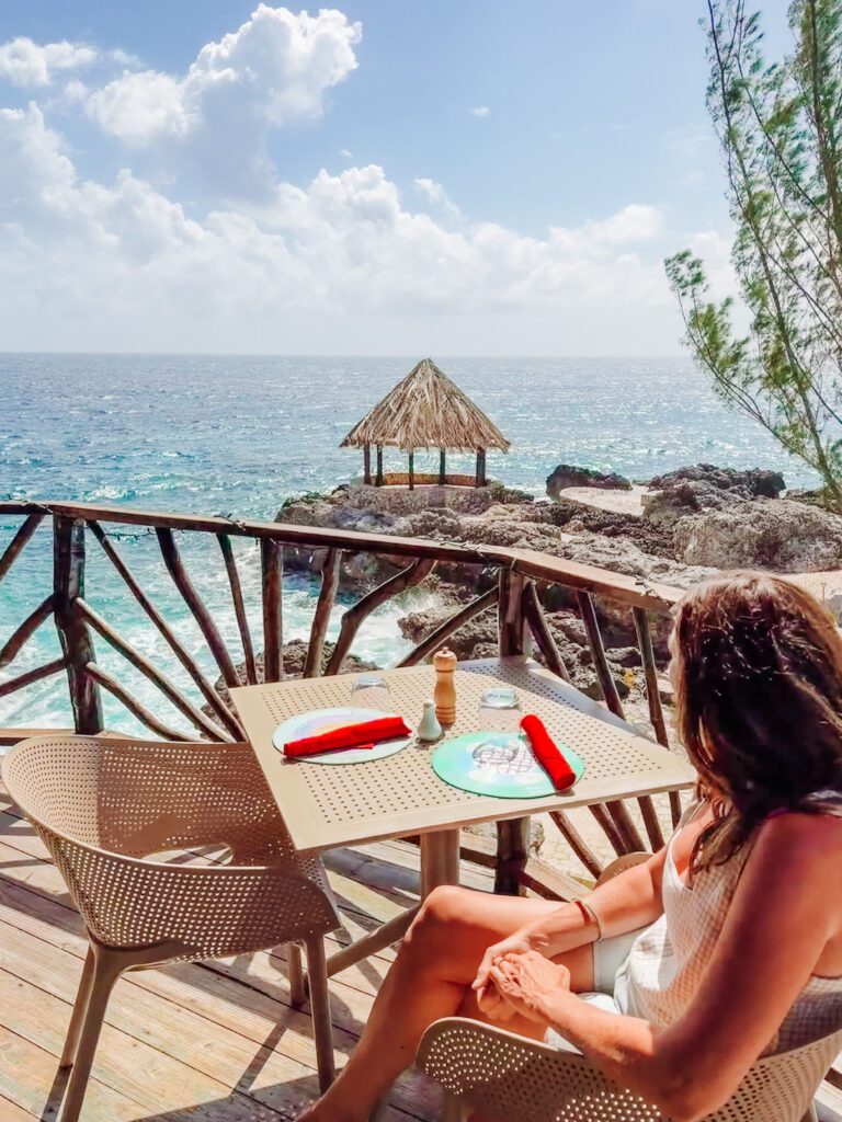 soaking up the views at the lodge restaurant, at tensing pen resort in negril