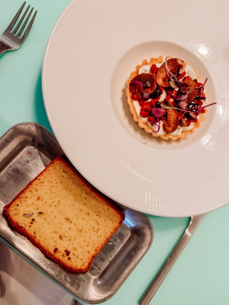 gluten free cheese tart course in test kitchen virgin voyages