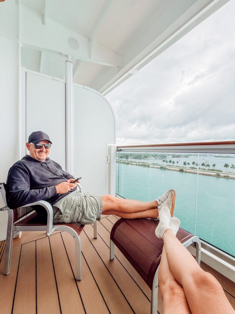 mike on the balcony of our cabin on msc cruise miami to bahamas