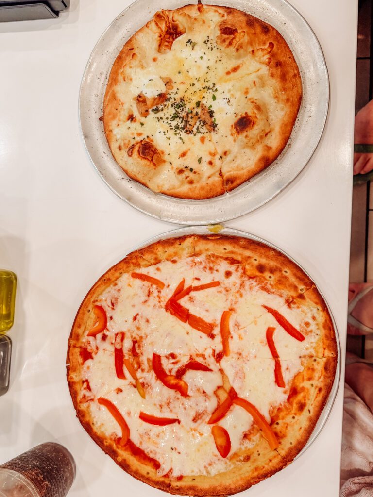 comparing the gluten free to normal pizzas on virgin voyages