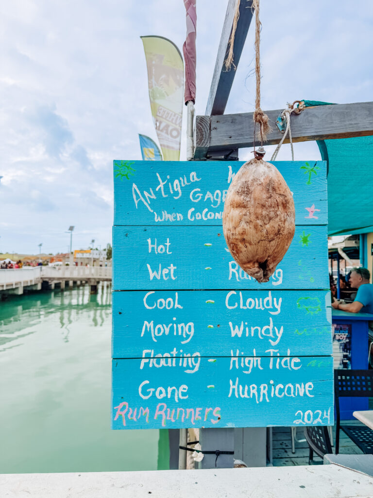 cute weather sign in antgua at the port
