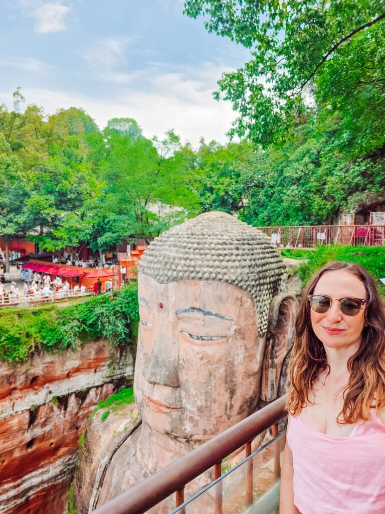 kelly at the head of the giant buddha at leshan