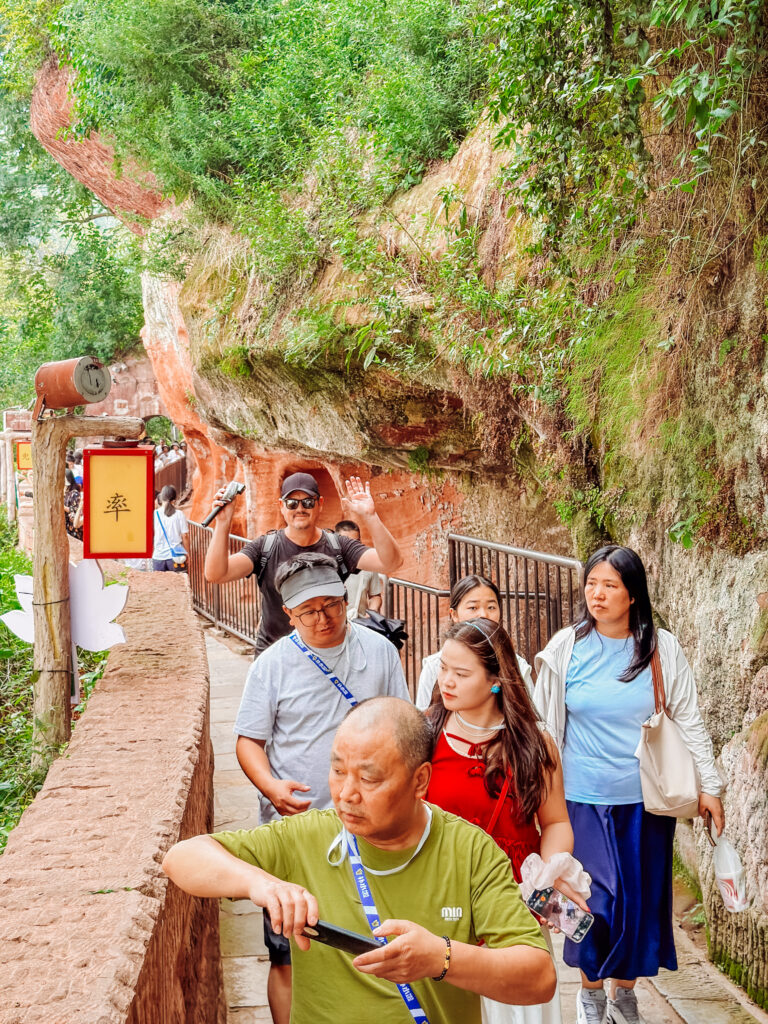 mike walking the giant buddha at leshan
