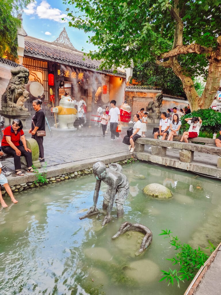 statues in the ancient streets of dujiangyan