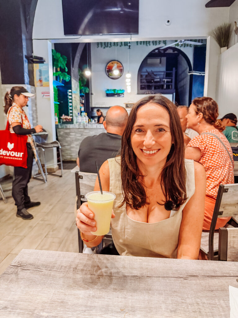 kelly with one of the pina coladas included in the food tour