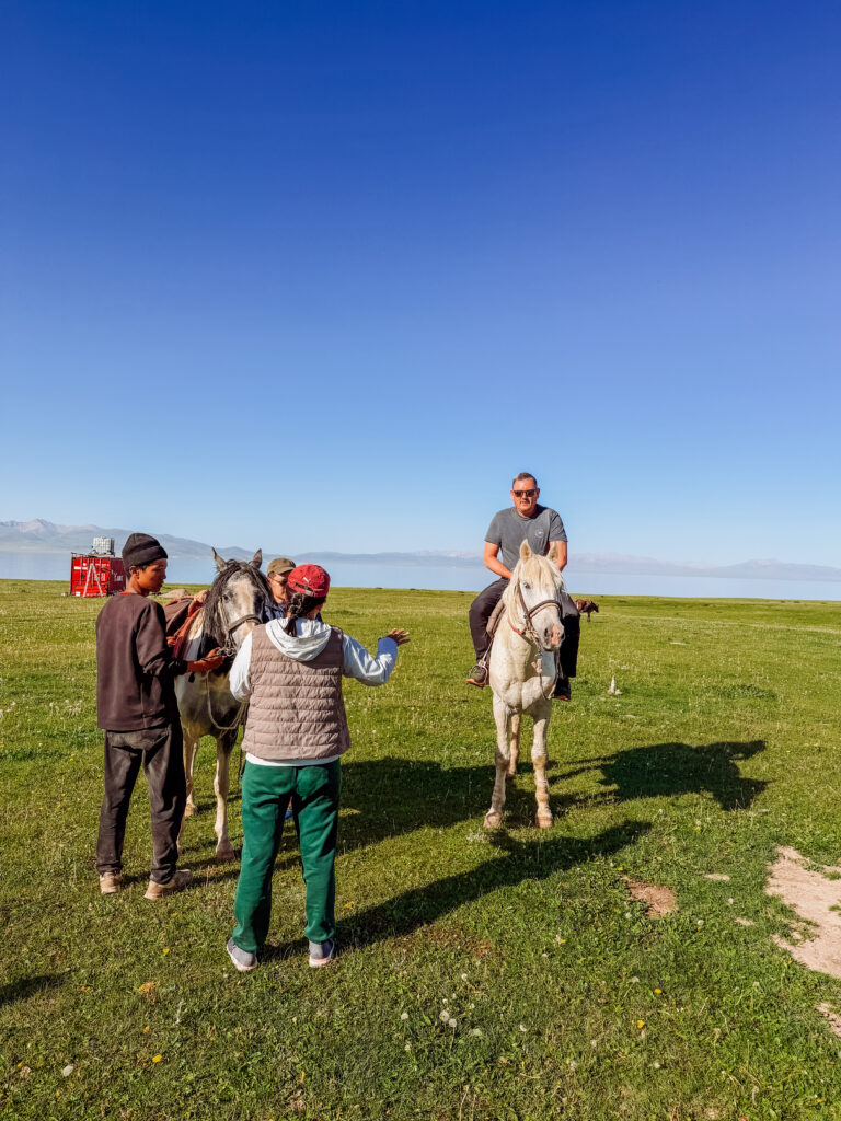 mike with the guide at song kul horse riding