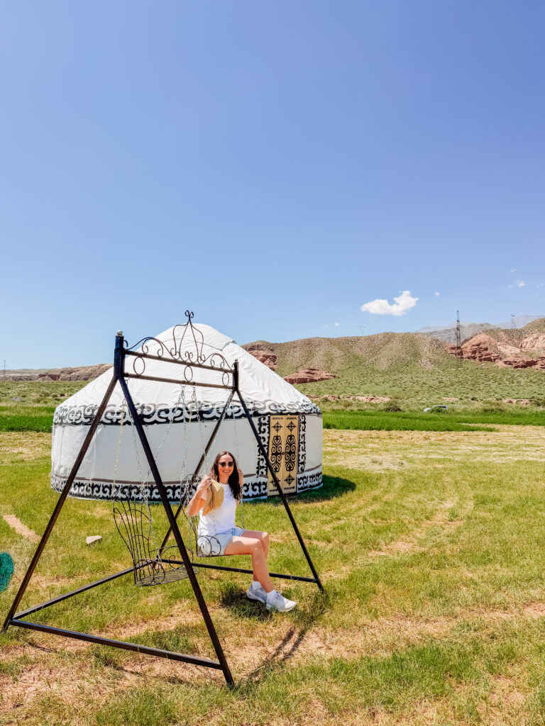 kelly at a stop along the countryside on our kyrgyz riders tour