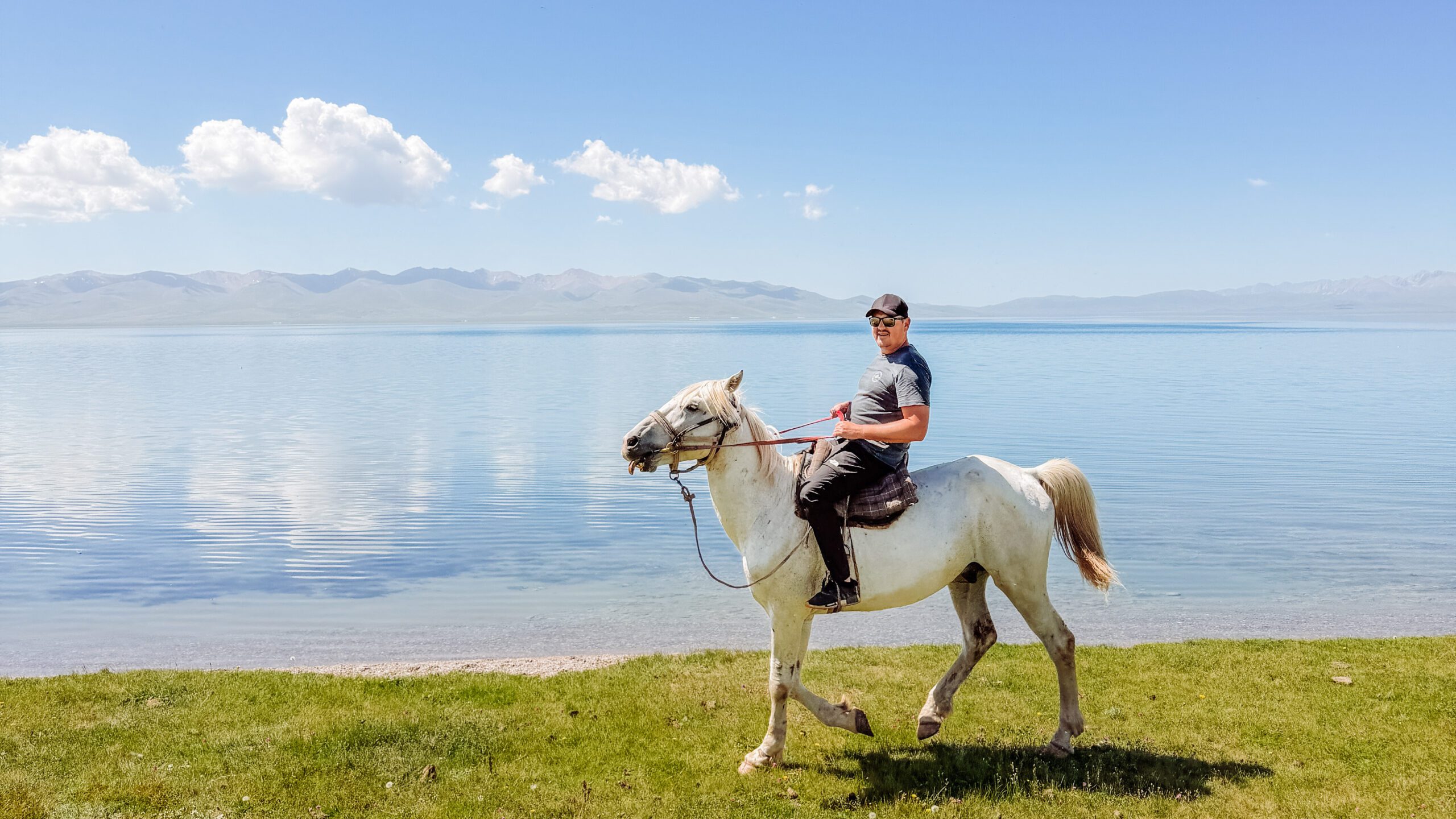 mike riding at song kul lake