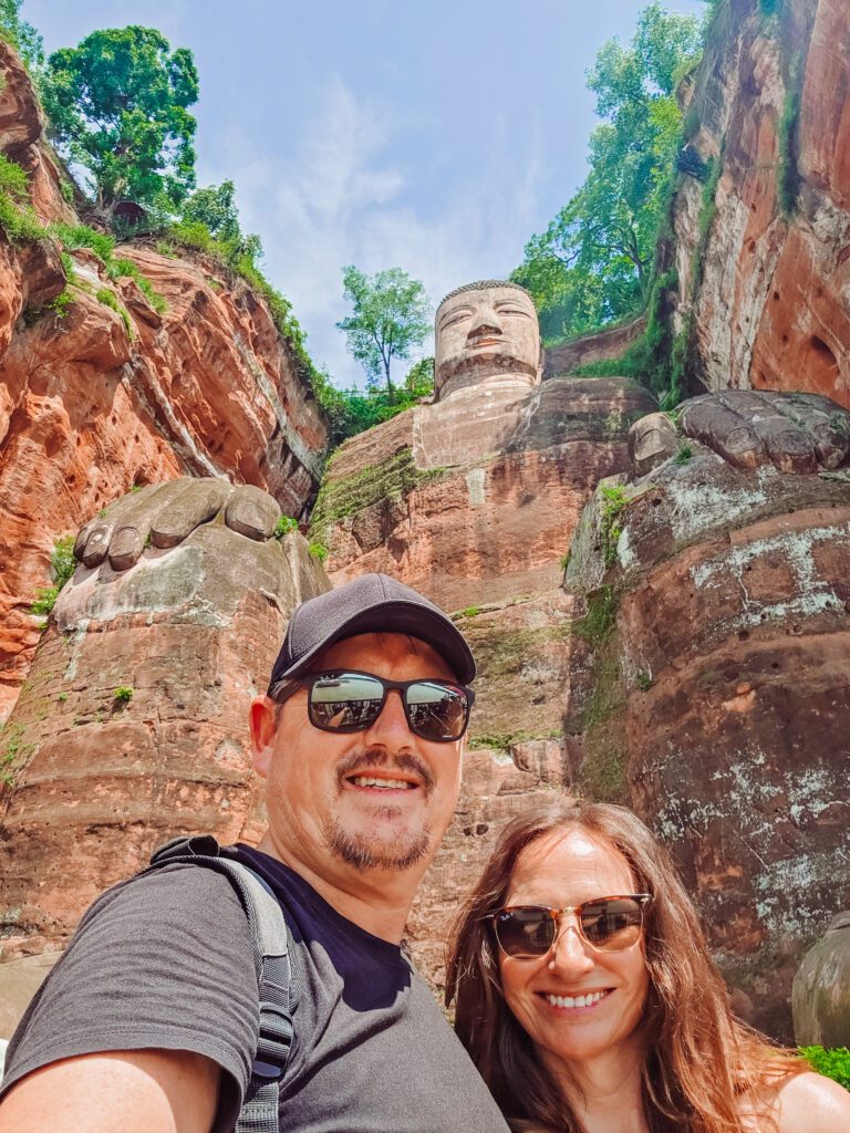 MIke and kelly at the bottom of the leshan giant buddha