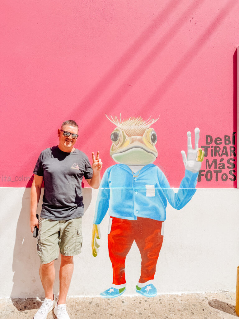 mike with the street art of old san juan