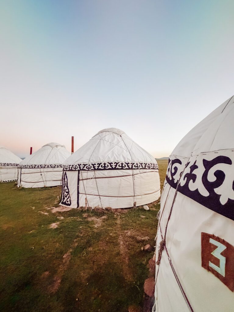 sunrise over the yurts at song kul