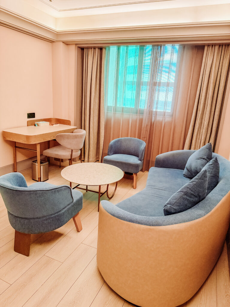 sitting area at the room in mercure chengdu