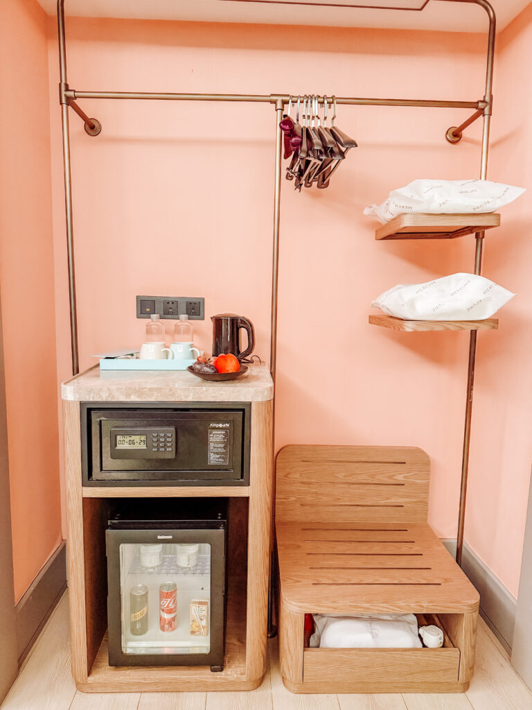 safe and storage area in our room at mercure chengdu